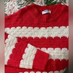 Red and cream striped sweater